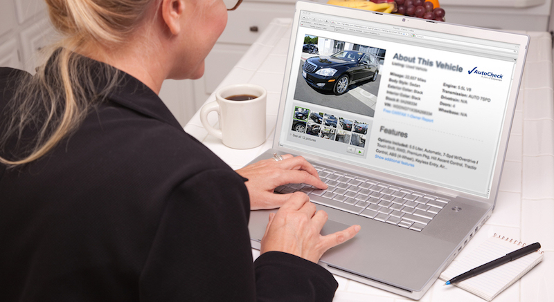 Online Car Shopping With Laptop